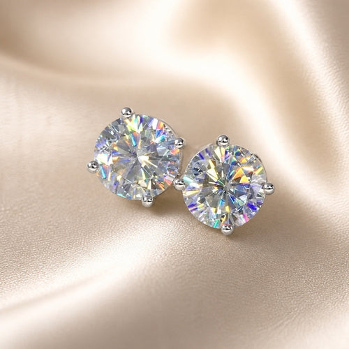 Stylish earrings in white gold with zirconia