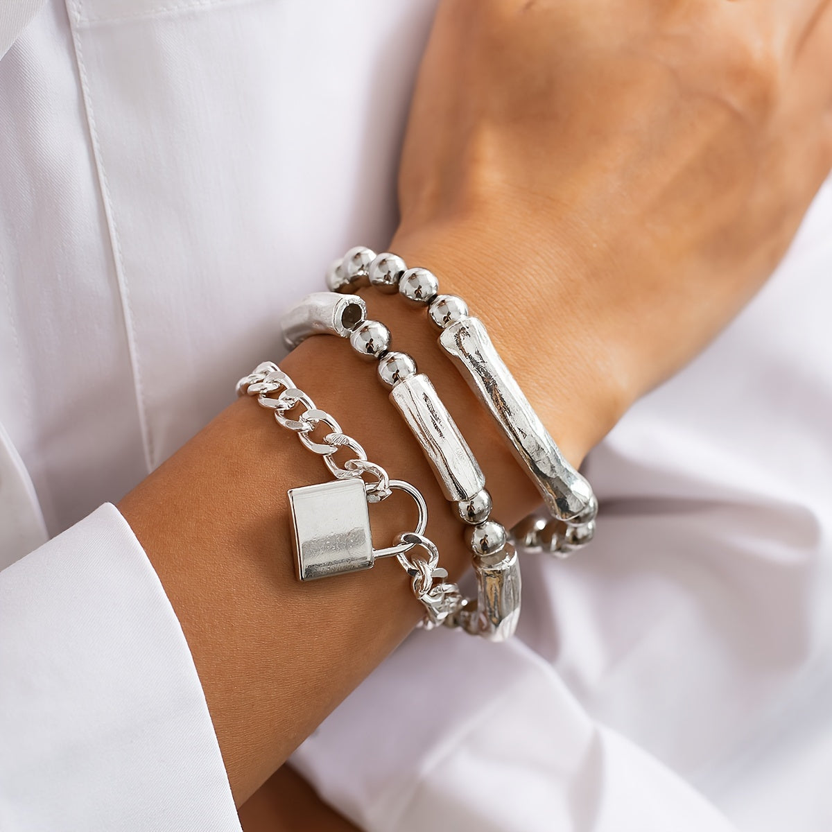Collection of Pearl Bracelets in White Gold with Punk Style Closure