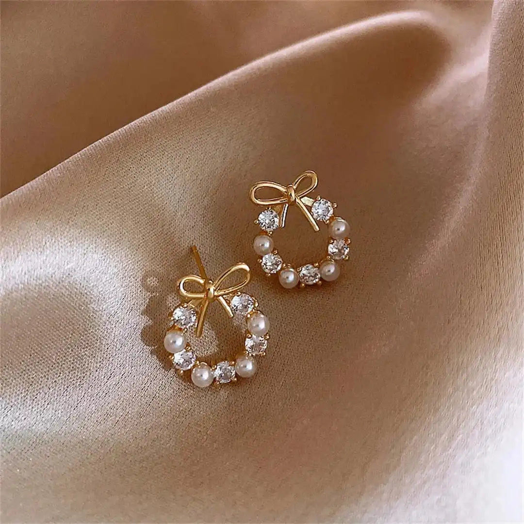 Ball Earrings in Ribbon Shape