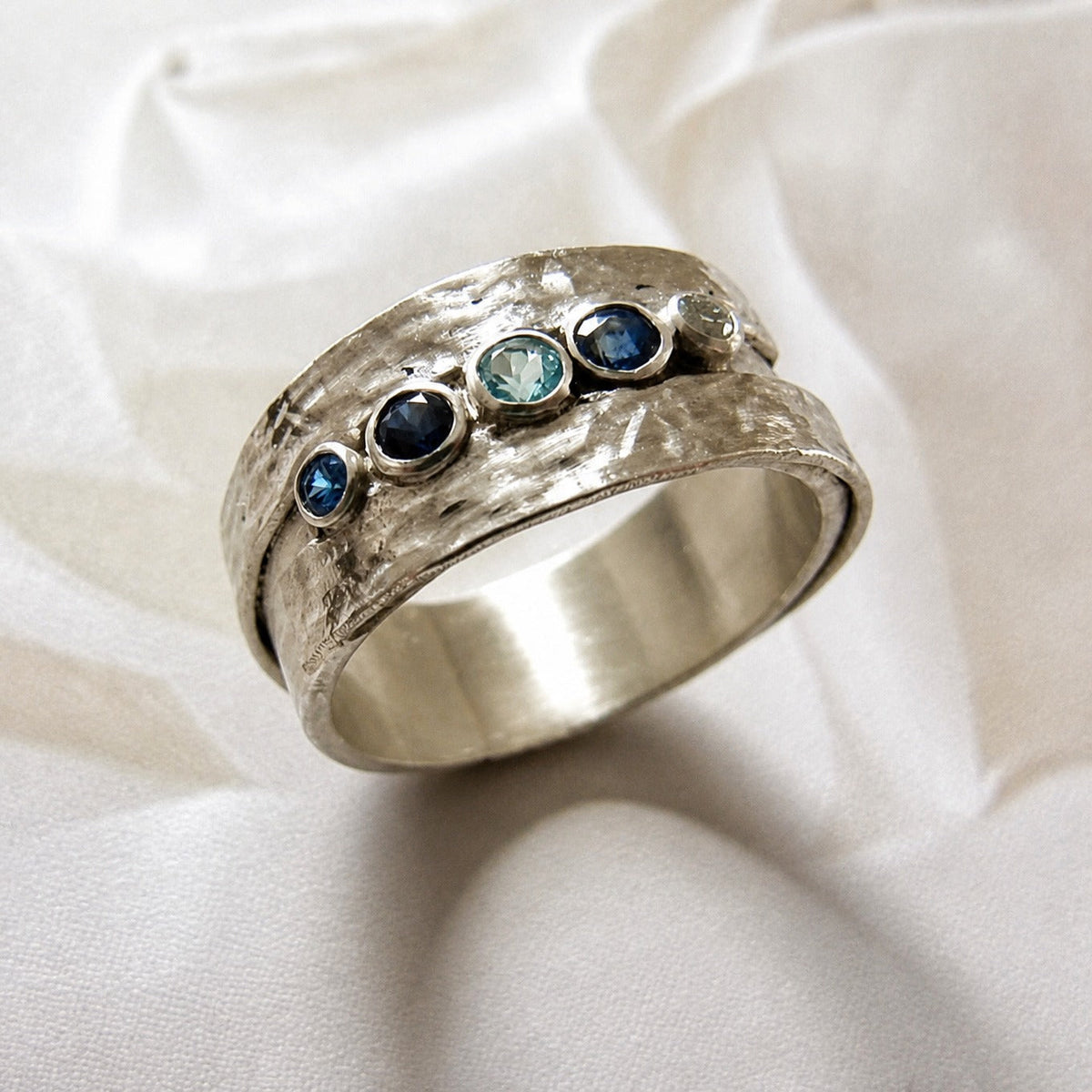 Ring with Blue Embedded Stones