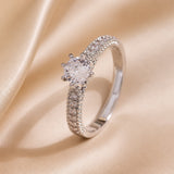 Basic white gold ring with integrated zirconia