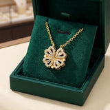 Gold Clover Necklace with Hanging Heart made of Zircon