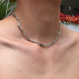 White Gold Necklace with Wave Twist Design