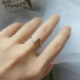 Slim white gold ring with zirconia in Z shape