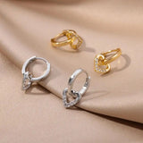 Dangling Heart-Shaped Earrings in Zirconia