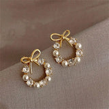 Ball Earrings in Ribbon Shape