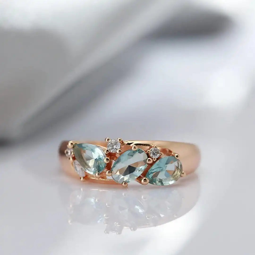 Romantic Rose Gold Ring with Blue Zircon