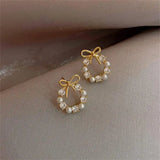 Ball Earrings in Ribbon Shape