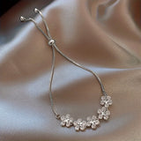 White Gold Bracelet with Zirconia in Flower Shape