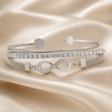 Collection of Bracelets with Rhinestones in White Gold and Infinity Design