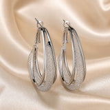 Luxury Drop Earrings Made of Zirconia and White Gold