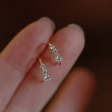 White gold earrings with small zirconias