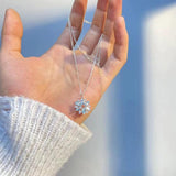 Blue Snowflake Pendant Necklace in White Gold with Flower