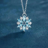 Blue Snowflake Pendant Necklace in White Gold with Flower